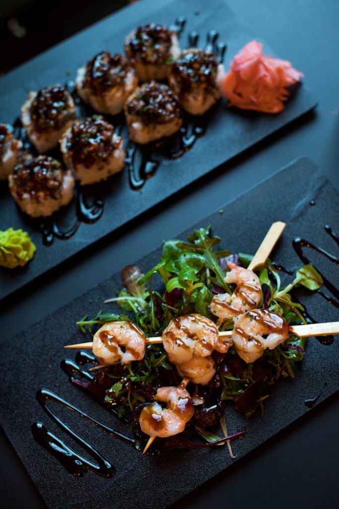 pexels photo 1833349 Delicious grilled shrimp skewers served with mixed greens and balsamic glaze, perfect for a gourmet dining experience.